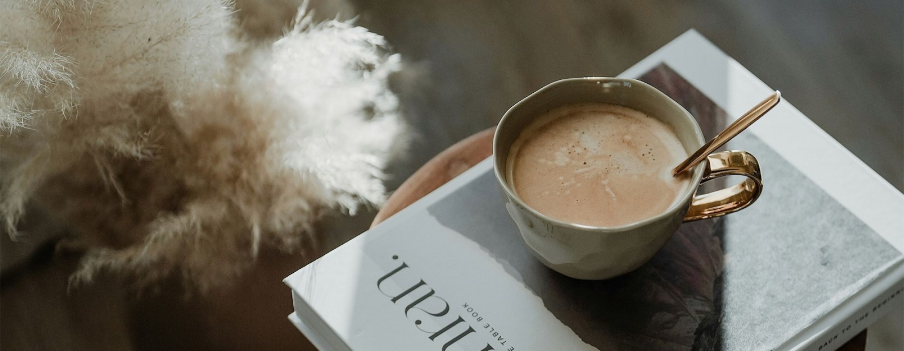 a coffee cup on a book